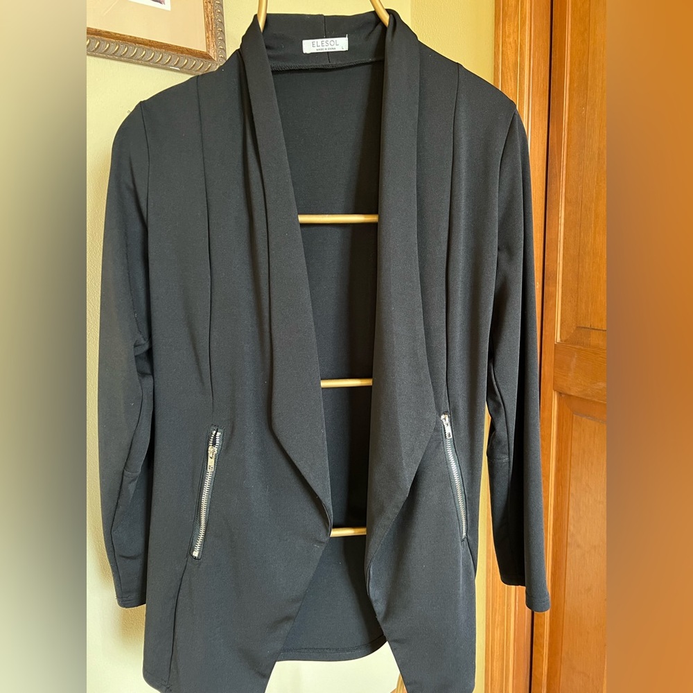 Black, large blazer, silver zippered front pockets, polyester/spandex, 29”L